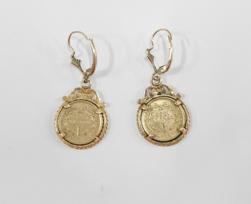 A pair of American one dollar earrings, each in dated 1853, in a clip yellow metal mount stamped 9ct - Image 2 of 3