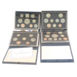 Four United Kingdom coin packs, comprising 1989, 1999, 1998, and 1988, boxed. (4)