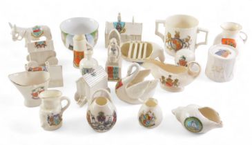 A quantity of crested china, to include a boat, a caravan, a drum, etc.