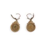 A pair of American one dollar earrings, each in dated 1853, in a clip yellow metal mount stamped 9ct