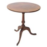 A 19thC mahogany occasional table, the circular tilt top on a turned column, tripod base with pad fe