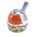 A Royal Crown Derby Robin Nesting paperweight, dated 1997, with silver stopper, 7cm high.