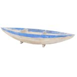 A plant or display stand, modelled in the form of a blue and cream painted rowing boat, 144cm wide.