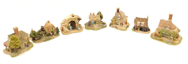 A quantity of Lilliput Lane cottages, to include Away in a Manger, Burley Street Garage, Blaise Haml