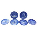 A collection of six Royal Copenhagen blue and white calendar plates, various dates, 18cm diameter.