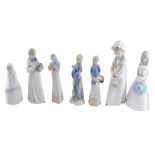 A group of Nao and other Spanish porcelain figures, the largest 26cm high. (7)