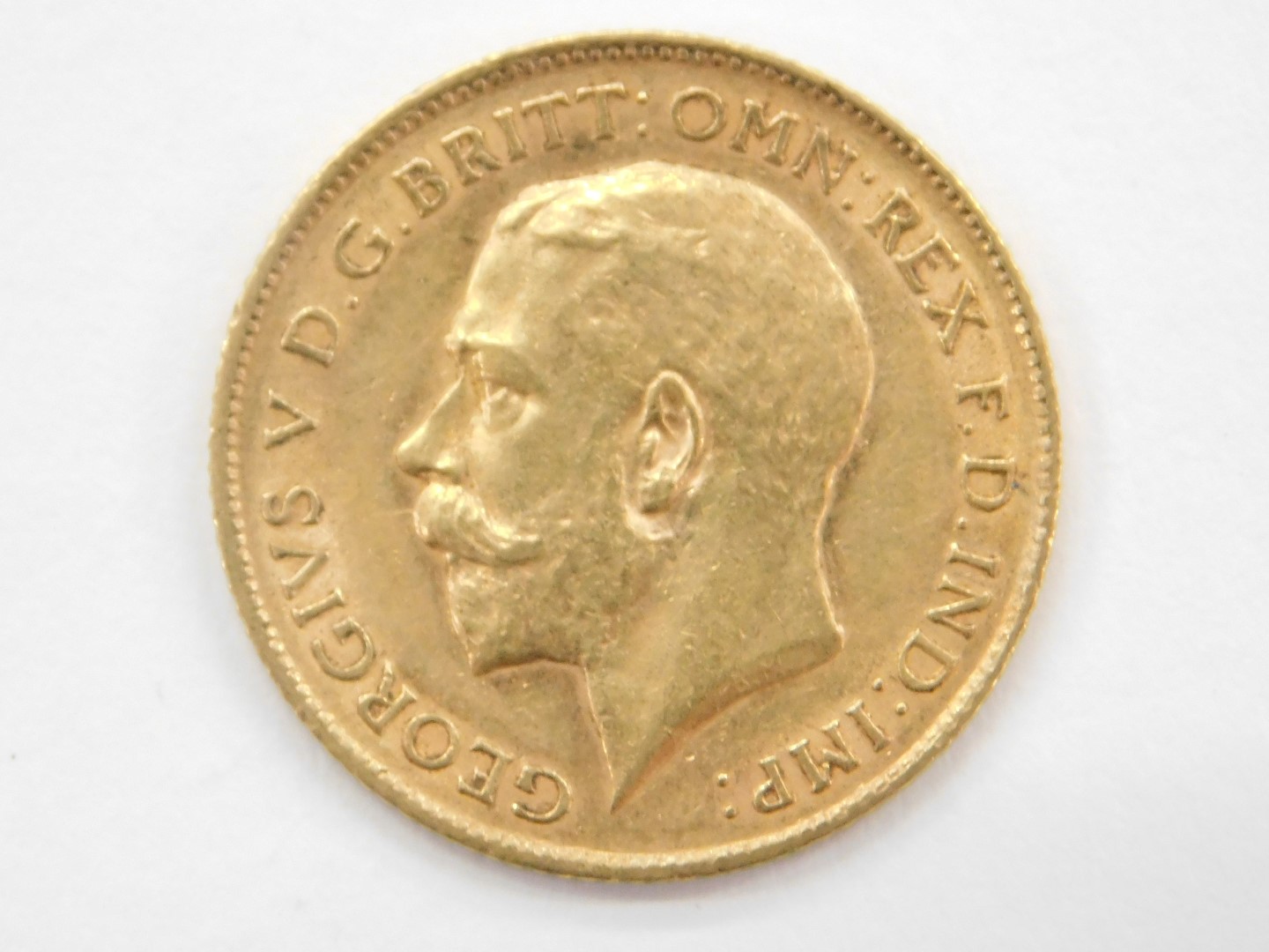 A George V half gold sovereign, dated 1911. - Bild 2 aus 2