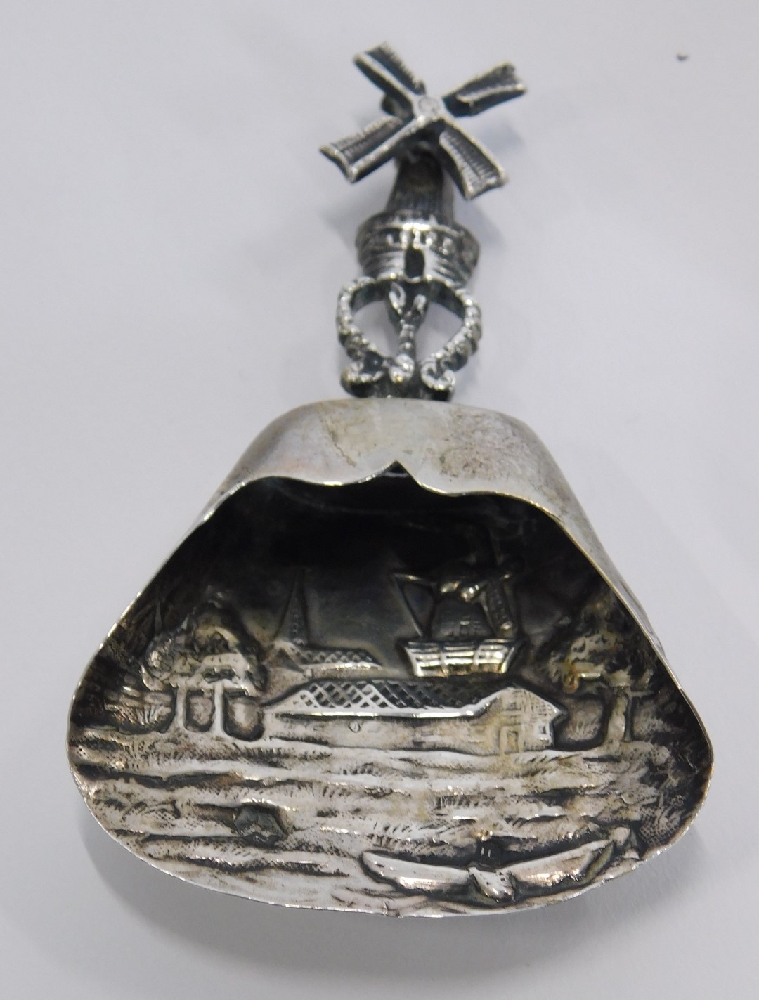 A Continental silver plated pill box, with embossed decoration of figures and animals on scroll deta - Image 2 of 4