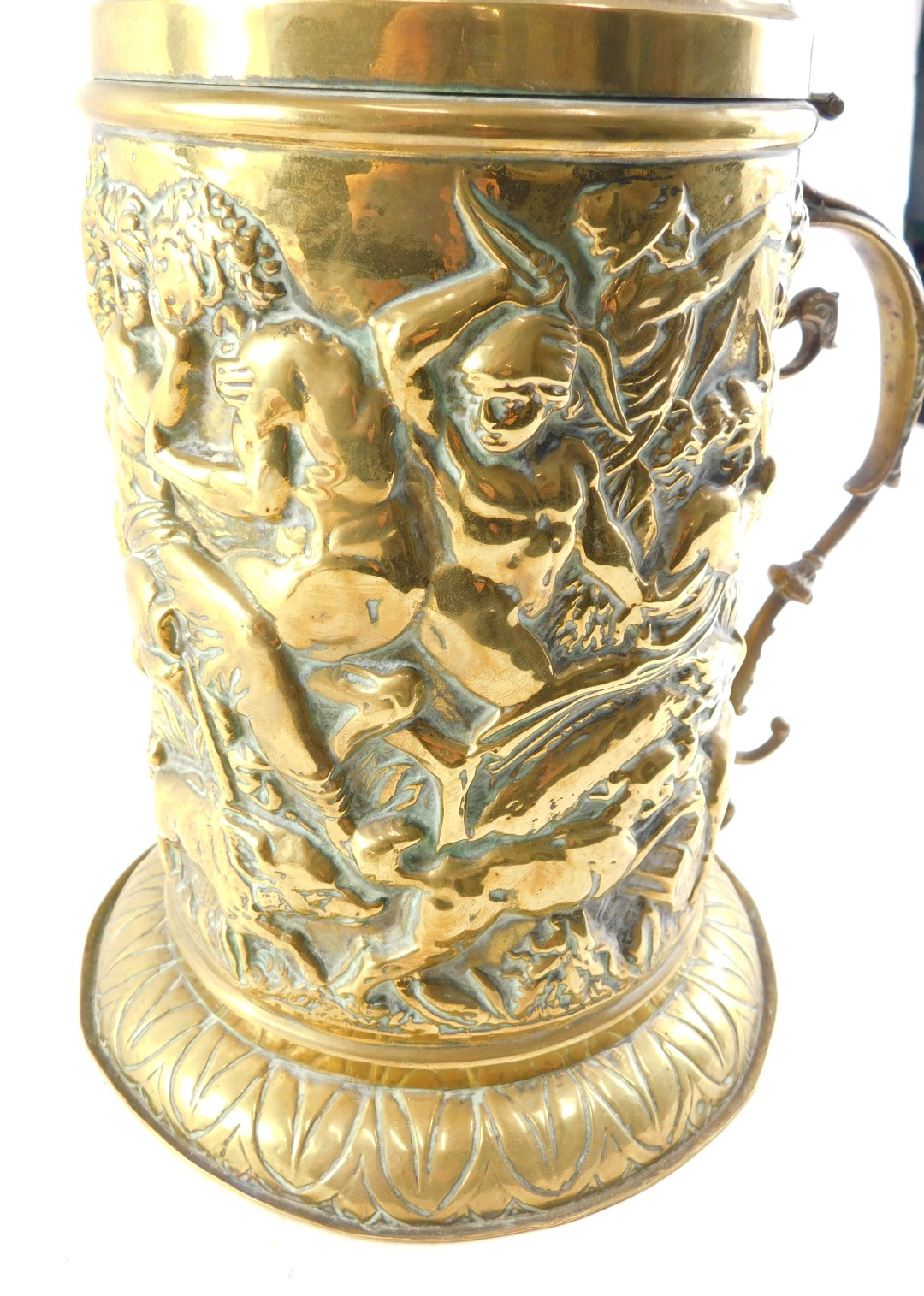 A 19thC continental embossed brass lidded tankard, decorated with figures boar hunting, and a scroll - Image 4 of 4