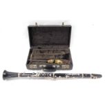 A Boosey & Hawkes Regent black clarinet, in fitted case.