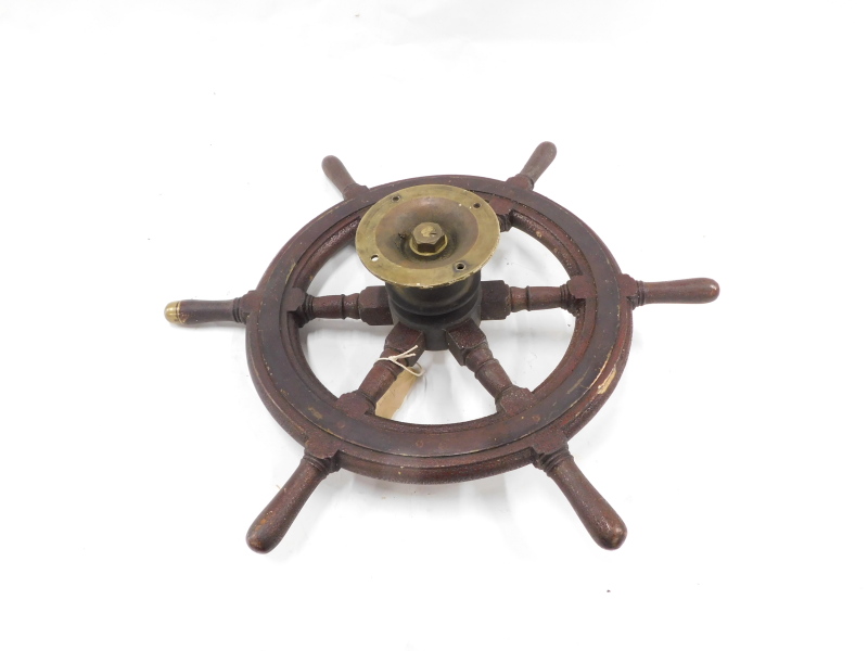 An early 20thC brass and wood ship's wheel, with turned handles, wall mount, possibly from a yacht, - Image 2 of 2