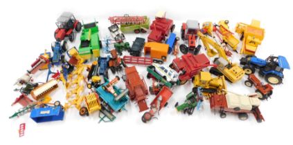 A box containing a large quantity of agricultural and other diecast vehicles, without boxes.