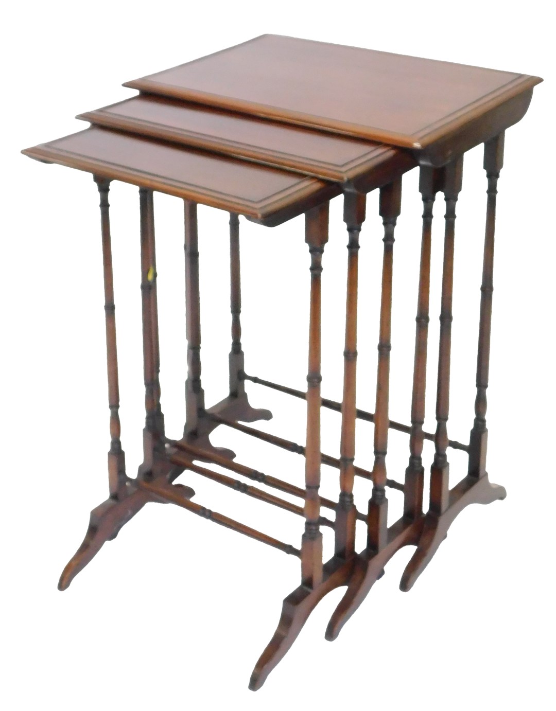 A nest of three 19thC mahogany tables, each with a rectangular top, on turned supports with splayed