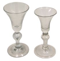 An 18thC wine glass, the tapering bowl, a double knopped stem and fold over foot, 17cm high, and ano