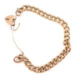 A 9ct rose gold curb link bracelet, with hammered curb links, safety chain and padlock, 20cm long, 1