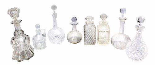 A quantity of 19thC and later decanters, to include a mallet shaped example with stopper, four bottl
