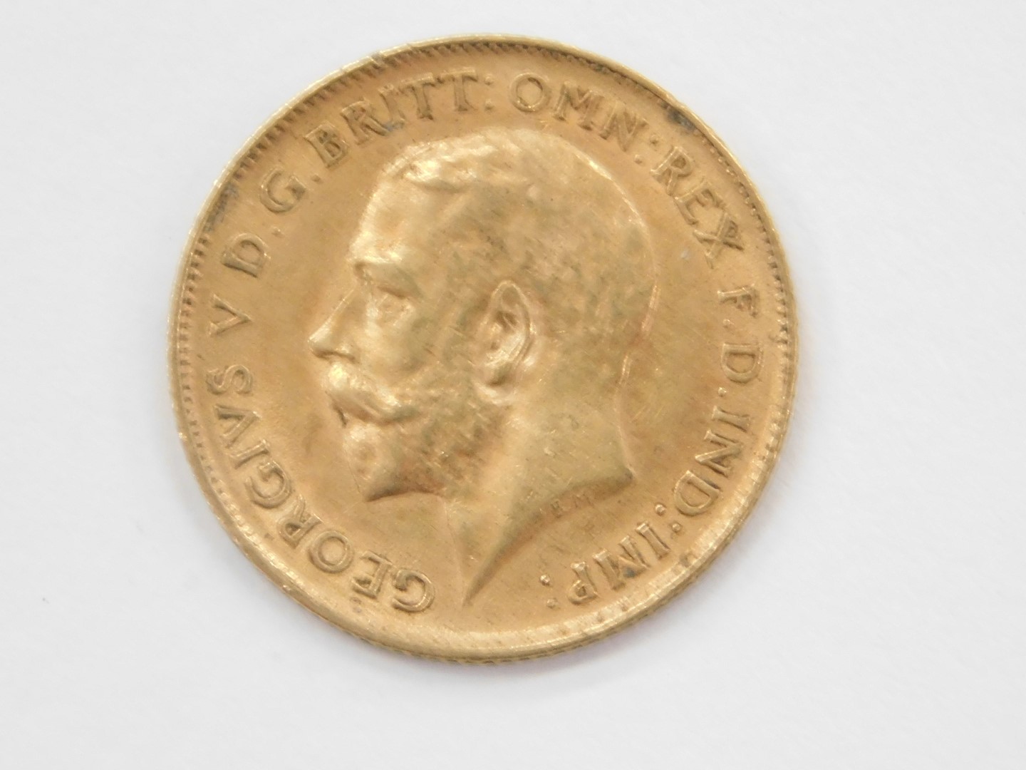 A George V half gold sovereign, dated 1912. - Bild 2 aus 2