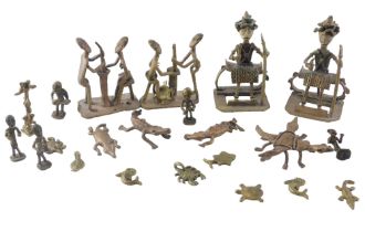 A group of tribal brass figures, 9cm high, etc.