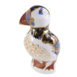 A Royal Crown Derby puffin paperweight, on silver stopper, 12cm high.