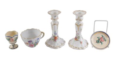 Continental porcelain, comprising a pair of German candlesticks on floral ground with gilt borders,