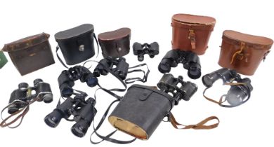 A quantity of binoculars, to include Primax Paris, etc.