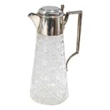 A late Edwardian silver mounted lidded claret jug, of tapered conical facet cut design, the mount an