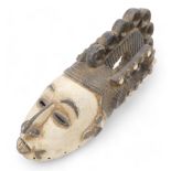 Tribal Art. Igbo/Ibo tribe, 'Agbogho Mmwo' Spirit Maiden mask, from village near Enugu, Nigeria, 61c