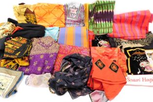 A quantity of Eastern fabrics, to include pieces with metallic threads, silks, costume bangles, etc.