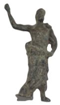 A Roman bronze statue of a female with raised hand, 11cm high.