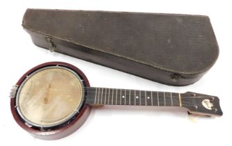 A Keech banjulele banjo, with an ebony finger board, etc., the skin described indistinctly Blackpool