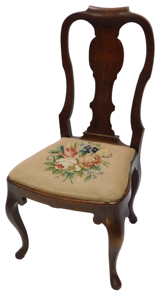 An oak side chair in Queen Ann style, the shaped back with a solid vase shaped splat, with a drop in