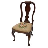 An oak side chair in Queen Ann style, the shaped back with a solid vase shaped splat, with a drop in