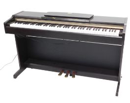 A Yamaha Clavinova CLP-115.