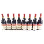Eight bottles of 2013 Cote du Rhone red wine.
