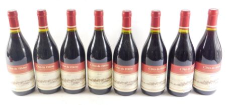 Eight bottles of 2013 Cote du Rhone red wine.