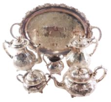 A John Turton silver plated six piece tea service, each with a bird shaped knop, and an oval two han