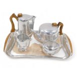 A Picquot ware aluminium four piece tea set, with two handled tray.