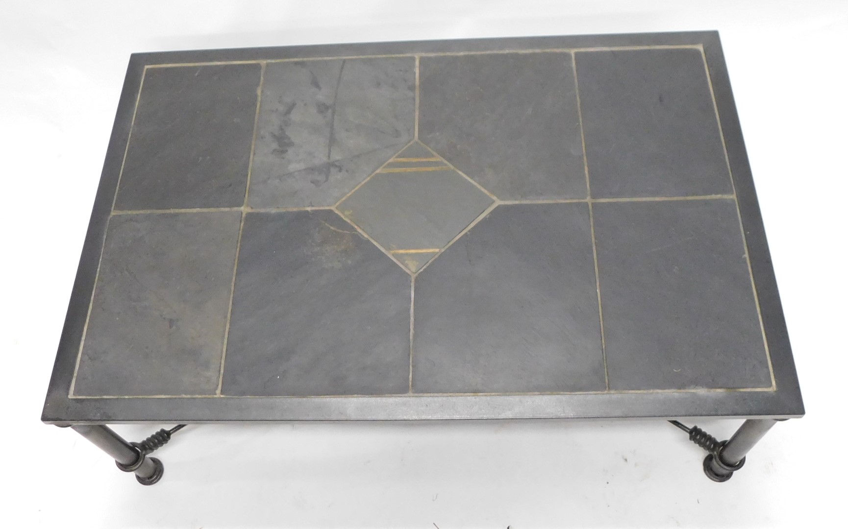 A wrought iron coffee table, the rectangular top inset with slate panels, on cylindrical legs, 119cm - Image 2 of 2
