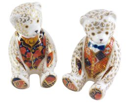 Two Royal Crown Derby Teddy bear paperweights, each with silver stopper, in differing waistcoats, 11