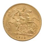 A George V half gold sovereign, dated 1913.