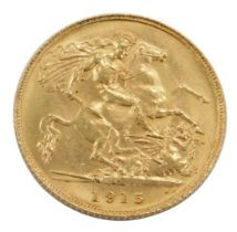 A George V half gold sovereign, dated 1915.