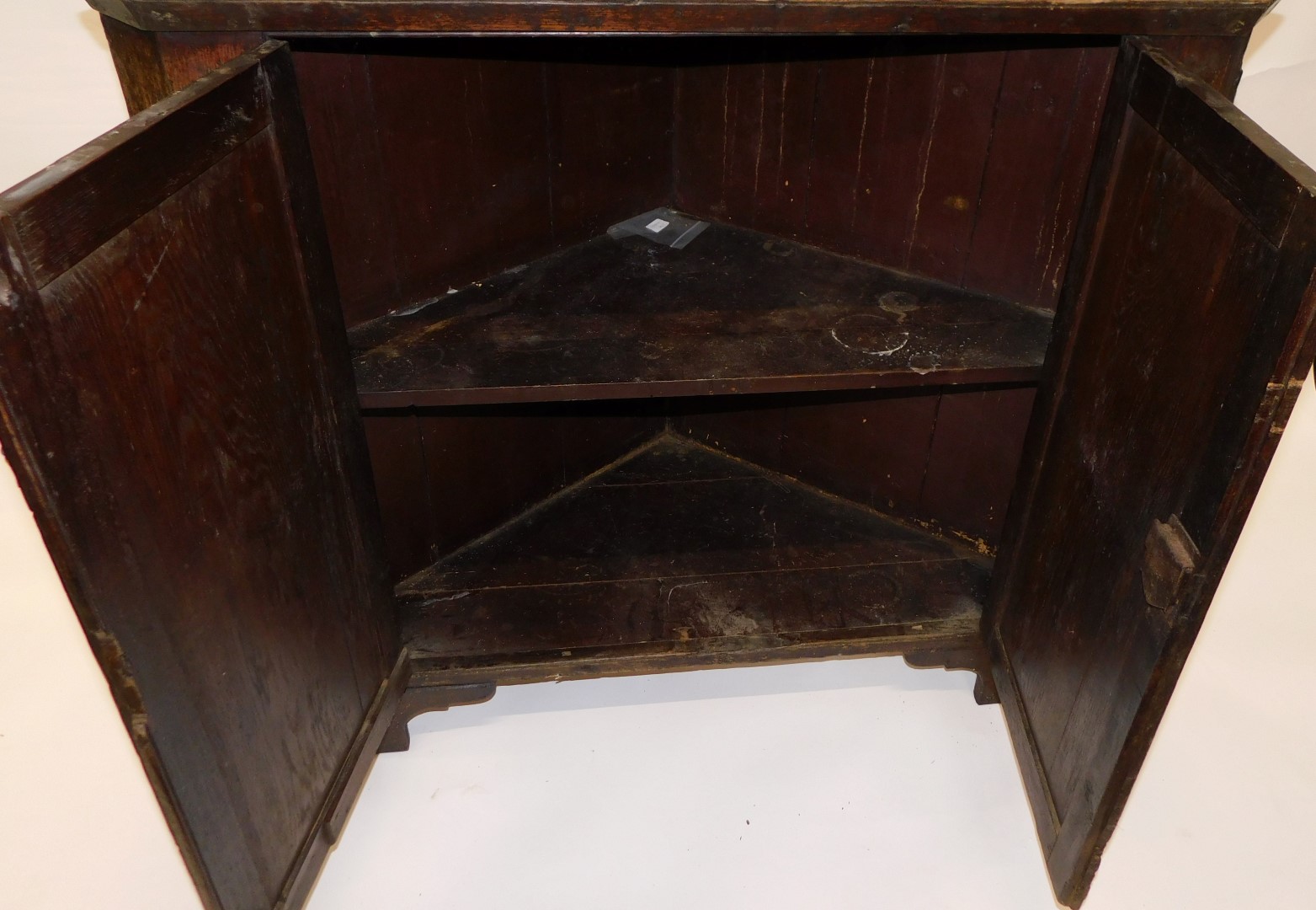 A George III oak standing corner cabinet, with a moulded cornice with two astragal glazed doors, the - Image 2 of 4