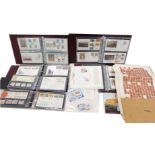 A large quantity of first day covers, presentation packs, etc. (6 albums)