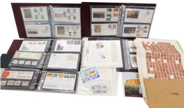 A large quantity of first day covers, presentation packs, etc. (6 albums)