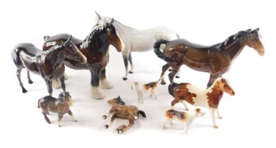 A quantity of Beswick horses, and two hounds. (AF)