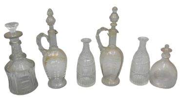 A collection of 19thC and later decanters, to include a pair of Victorian claret jugs, each with ena