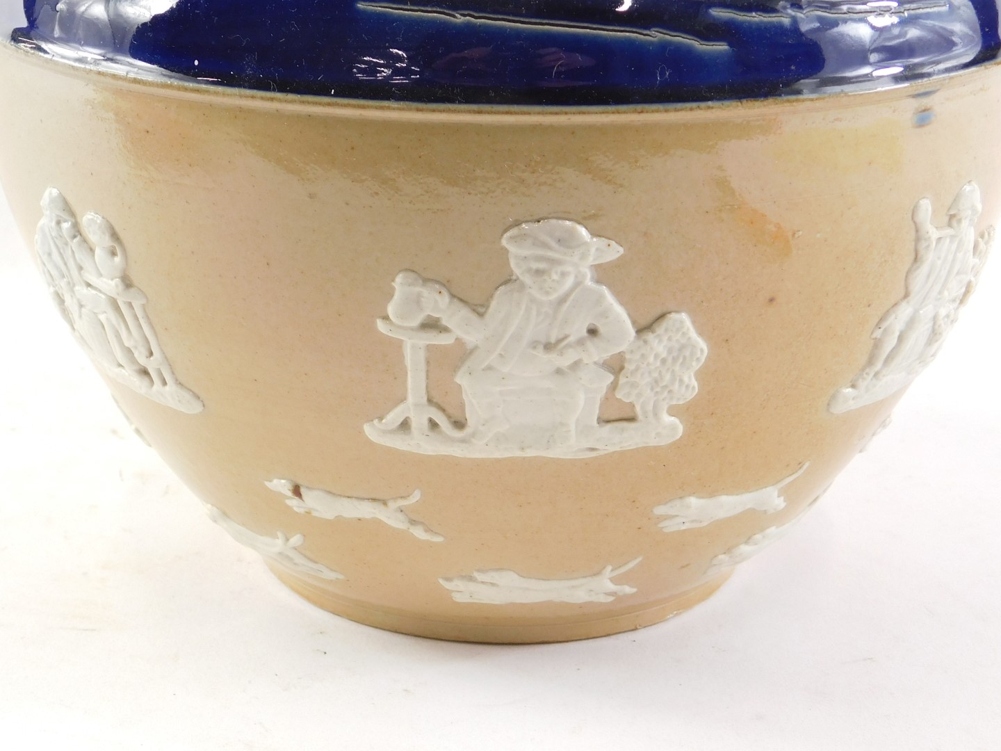 A Doulton Lambeth stoneware jardiniere, decorated in relief with hunting and tavern scenes, a windmi - Image 2 of 3