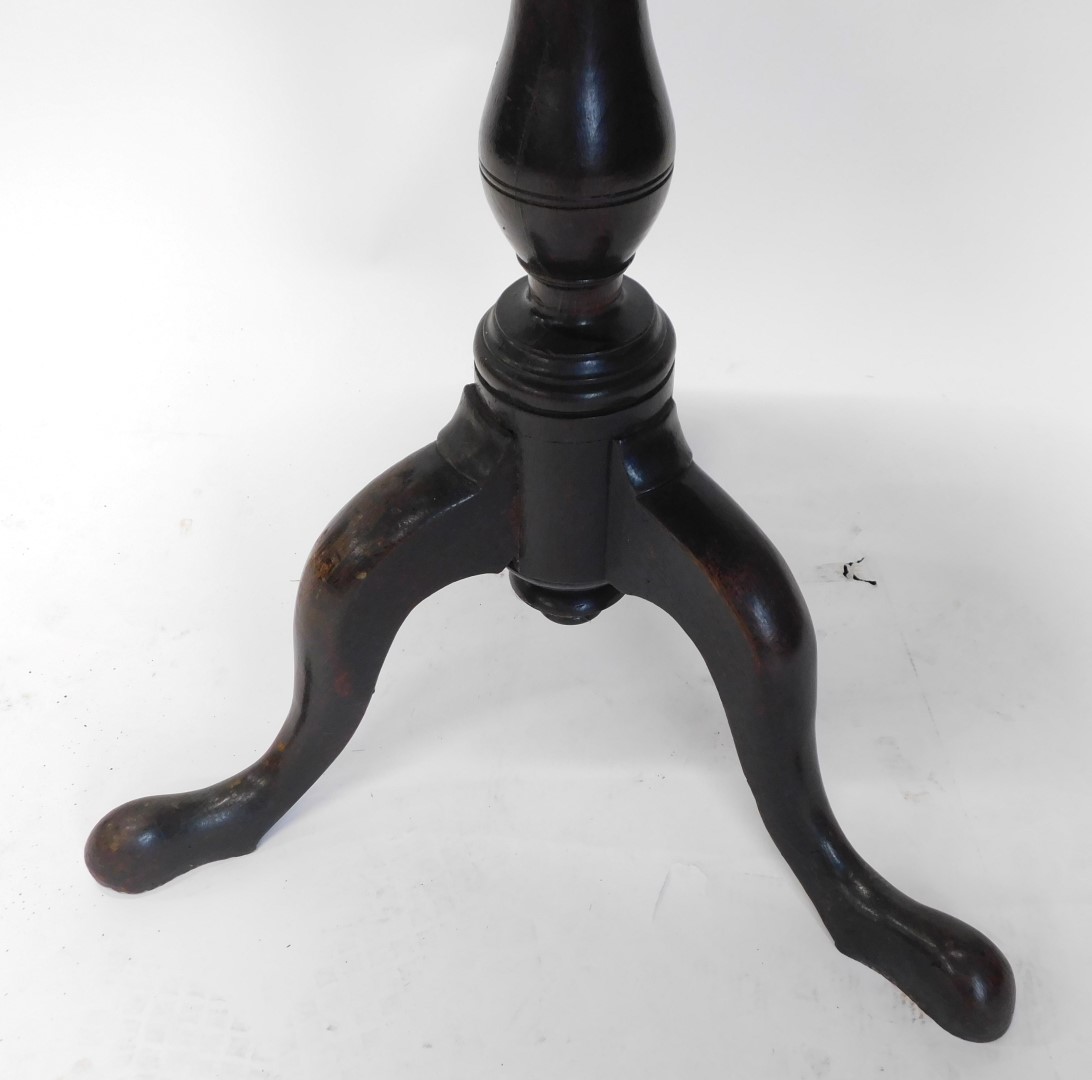 A 19thC mahogany occasional table, the circular tilt top on a turned column tripod base, with pad fe - Image 3 of 3
