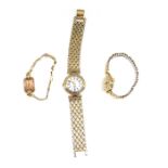 Three wristwatches, comprising a 9ct gold cased Smiths Deluxe lady's wristwatch, on expanding plated