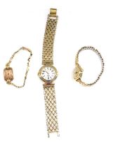 Three wristwatches, comprising a 9ct gold cased Smiths Deluxe lady's wristwatch, on expanding plated